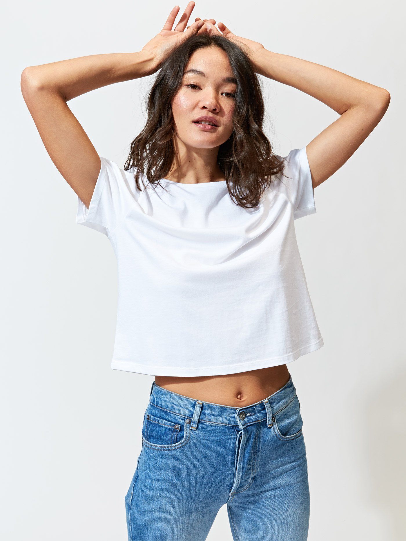 Women’s Invincible Cropped Crew Tee in White – Threads 4 Thought